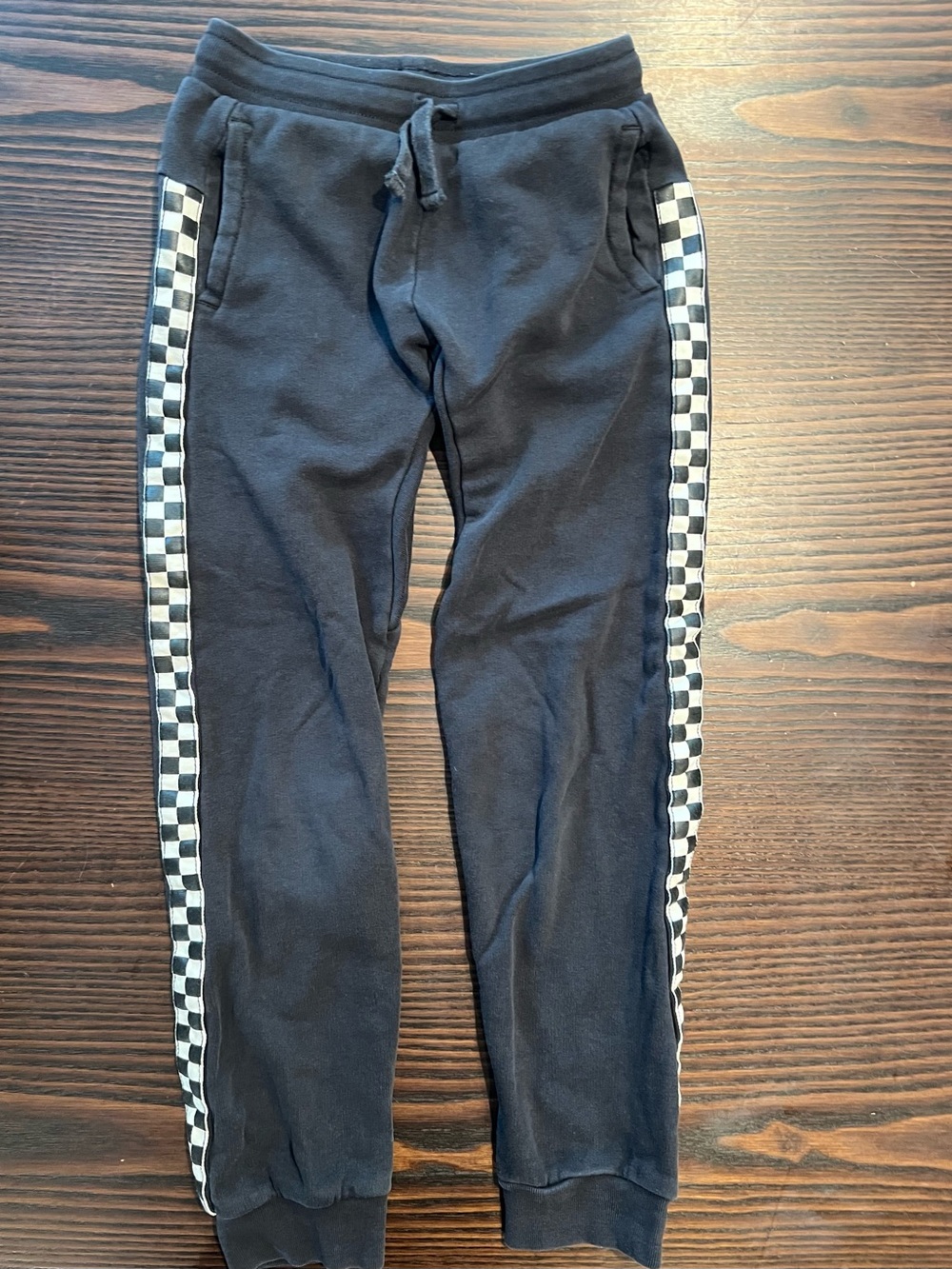 Tea Collection Black Joggers with Black-and-White Checkerboard Side Stripe